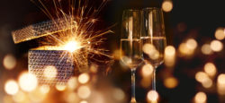 Sparkling New Year wishes with sparkling wine and golden lights